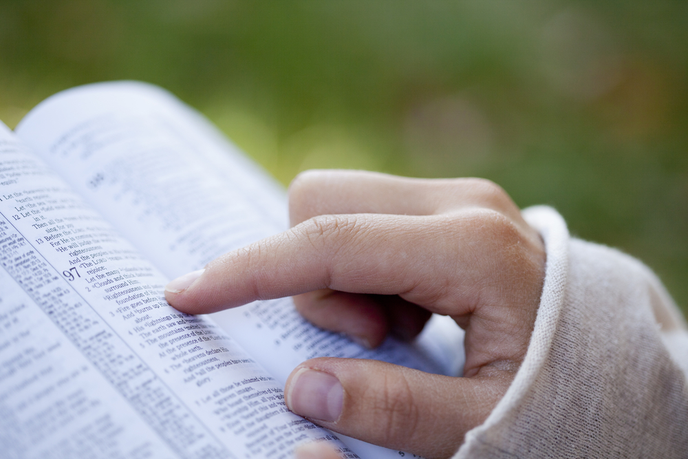 close-up-of-a-woman's-hands-reading-and-studying-the-Bible